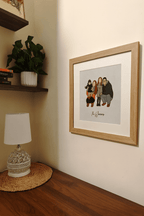 Custom embroidered family portrait in frame